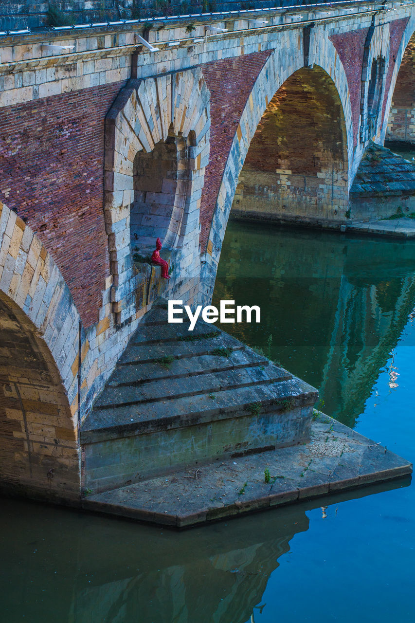 Arch bridge over river