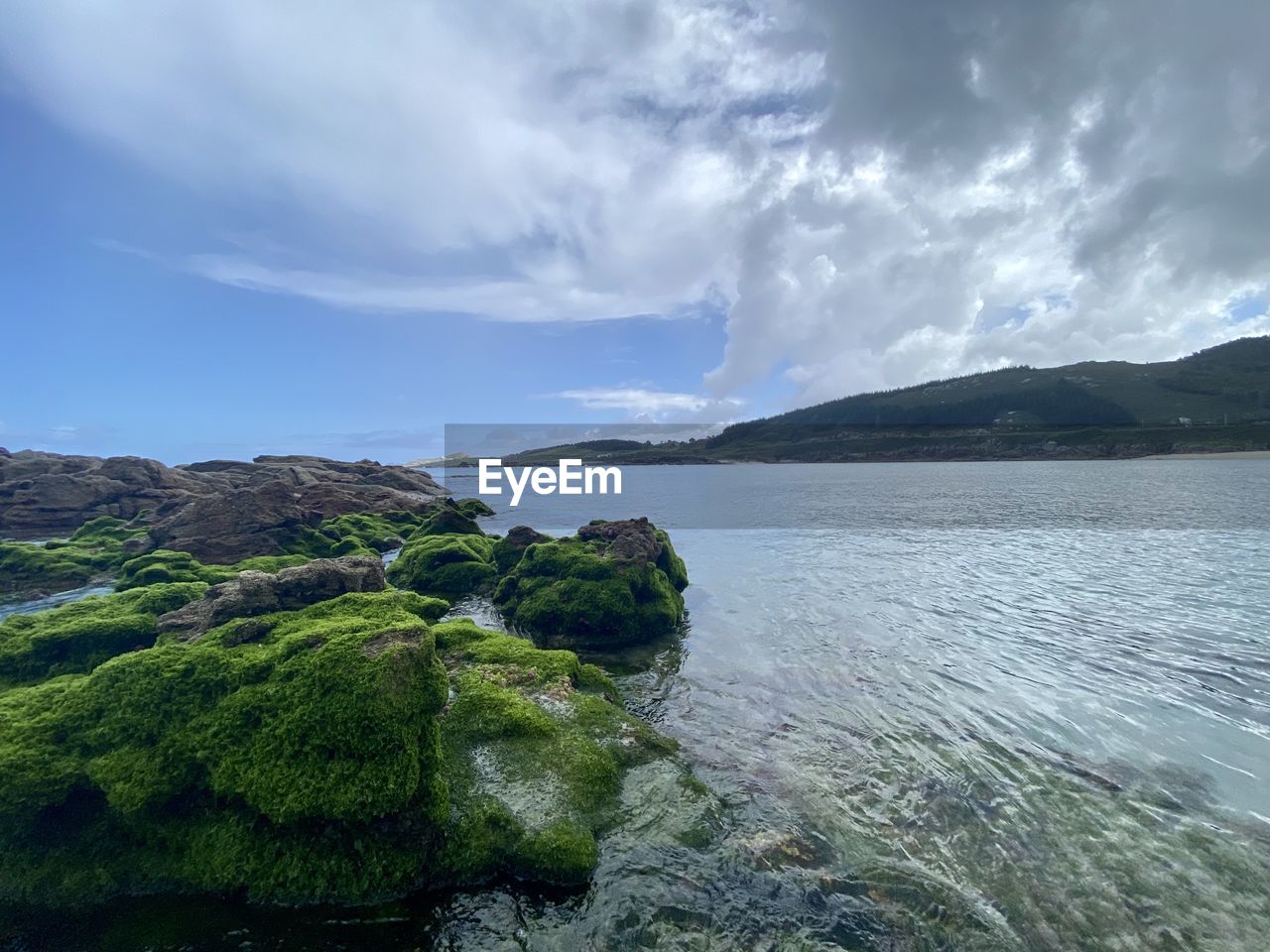 water, sky, scenics - nature, cloud, beauty in nature, environment, sea, coast, body of water, land, nature, landscape, mountain, ocean, shore, no people, tranquility, beach, travel destinations, travel, tranquil scene, rock, bay, highland, horizon, outdoors, tourism, day, plant, coastline, non-urban scene, cliff, terrain, idyllic, dramatic sky, seascape, overcast, blue, island