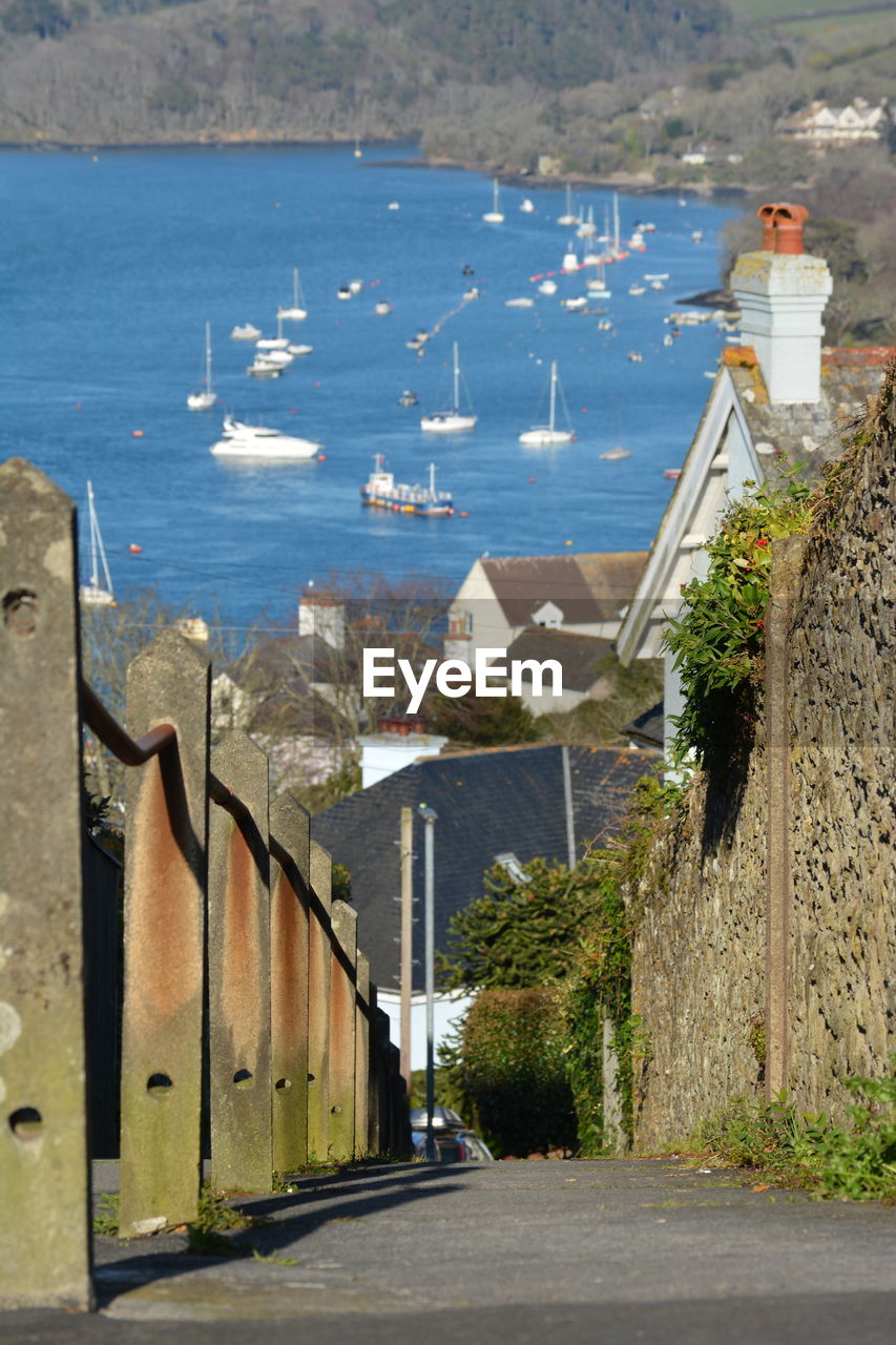 High angle view of buildings by sea