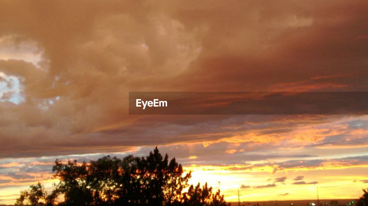 LOW ANGLE VIEW OF CLOUDY SKY DURING SUNSET