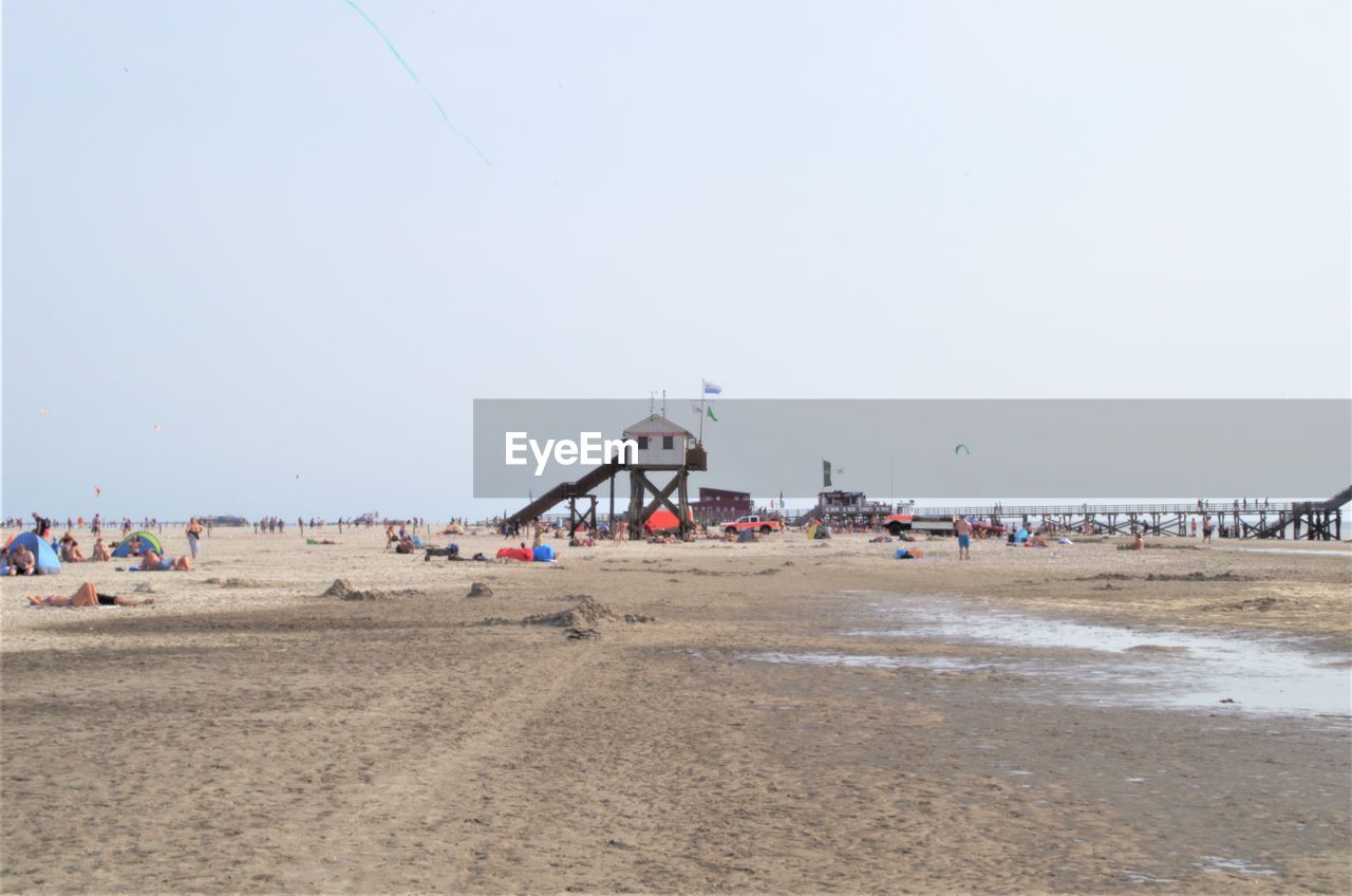 GROUP OF PEOPLE ON BEACH