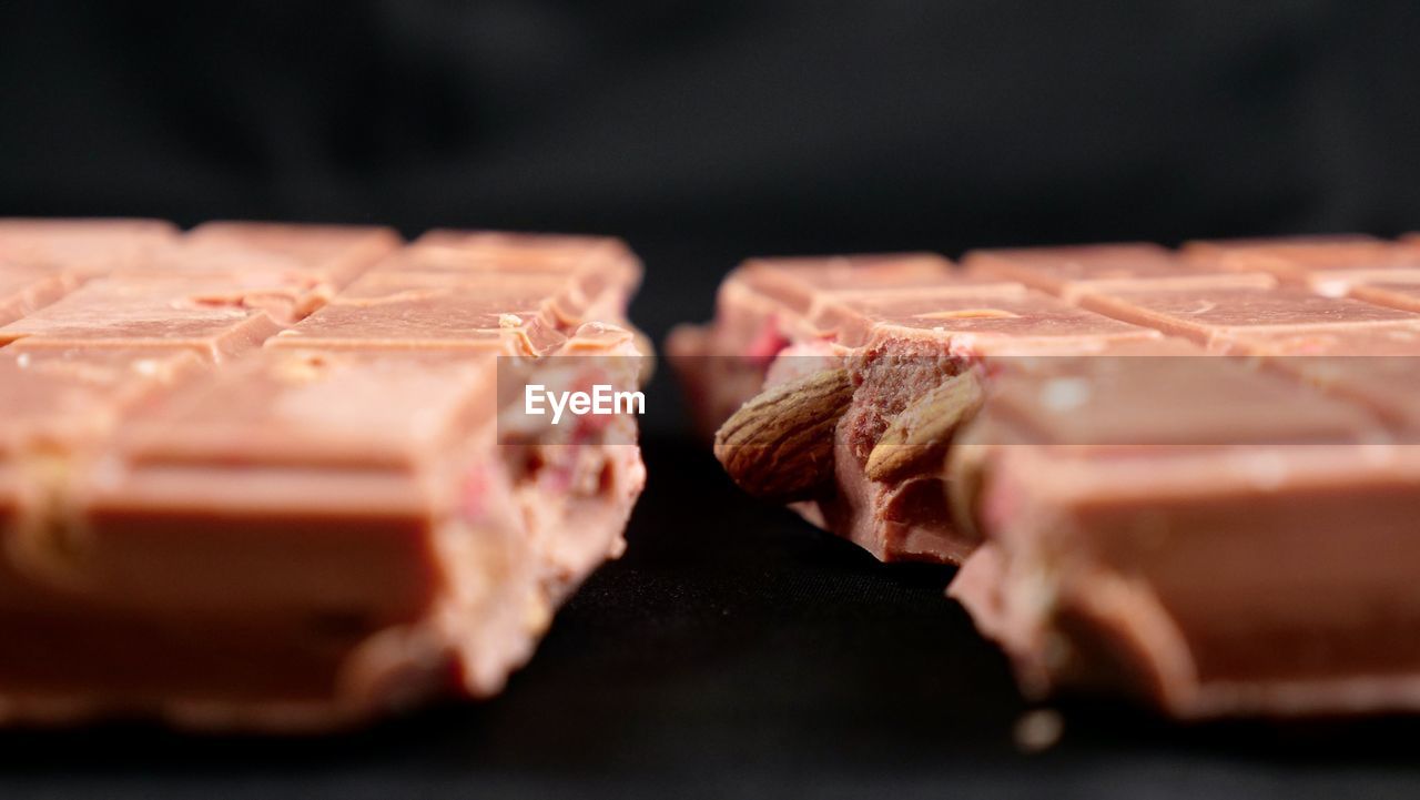 food and drink, food, meat, freshness, red meat, indoors, beef, no people, dessert, selective focus, close-up, chocolate, pork, chocolate brownie, still life, studio shot, black background, slice, dish