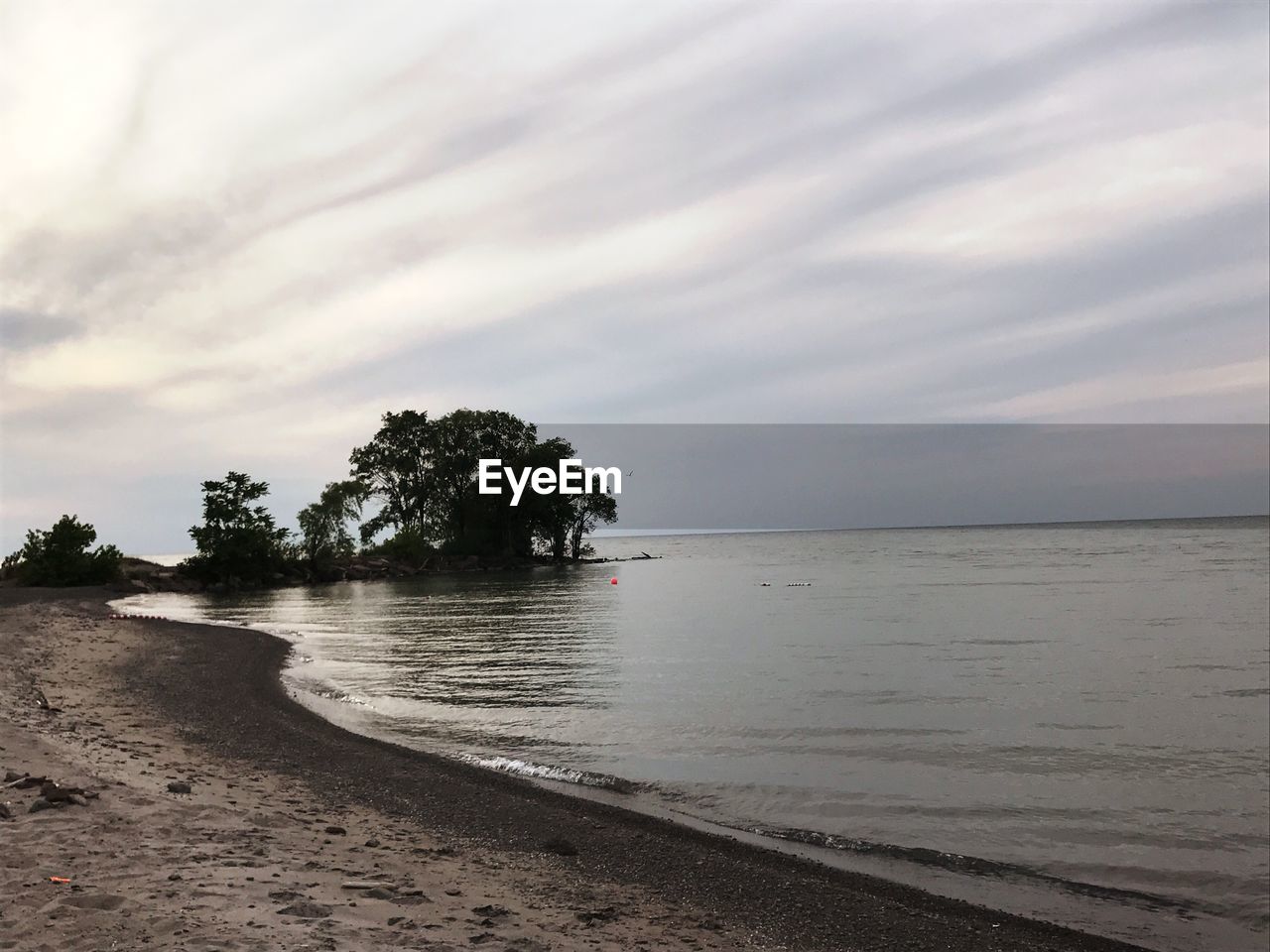 VIEW OF BEACH AGAINST SKY