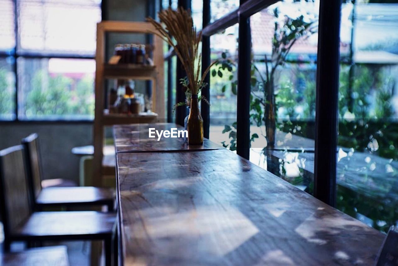 EMPTY TABLES AND CHAIRS IN RESTAURANT