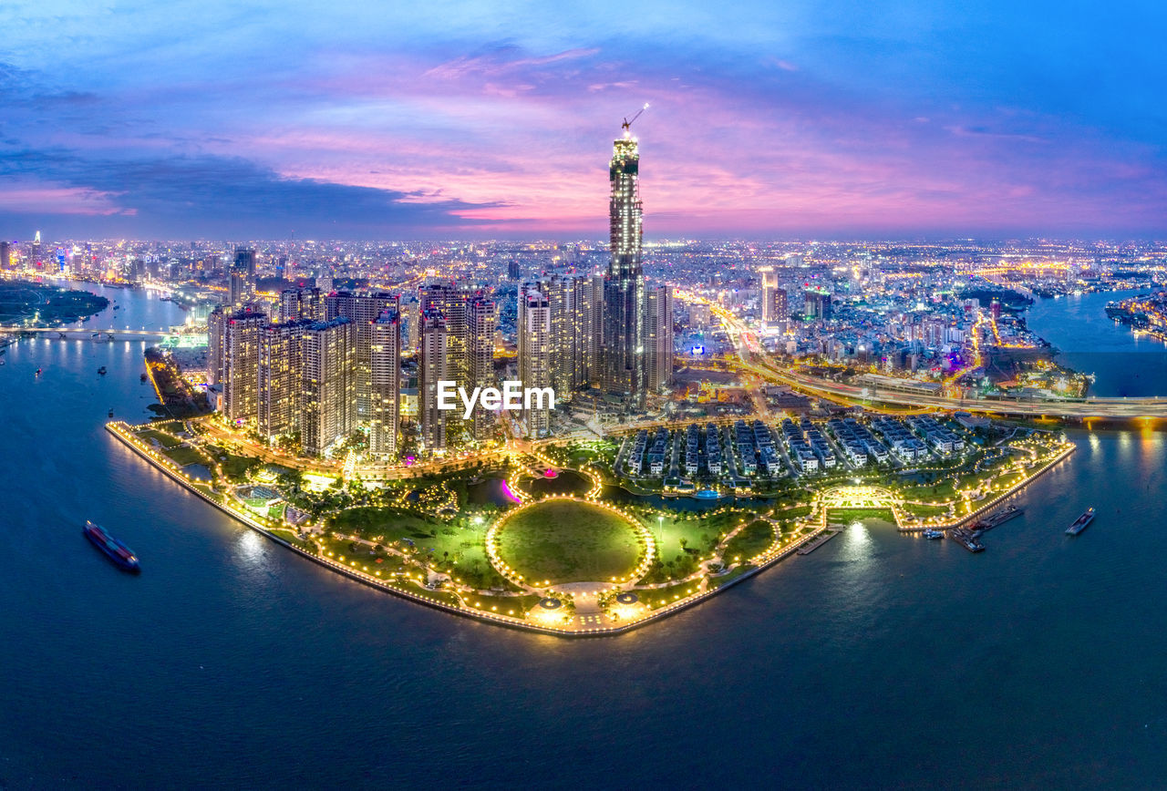 Illuminated cityscape at dusk