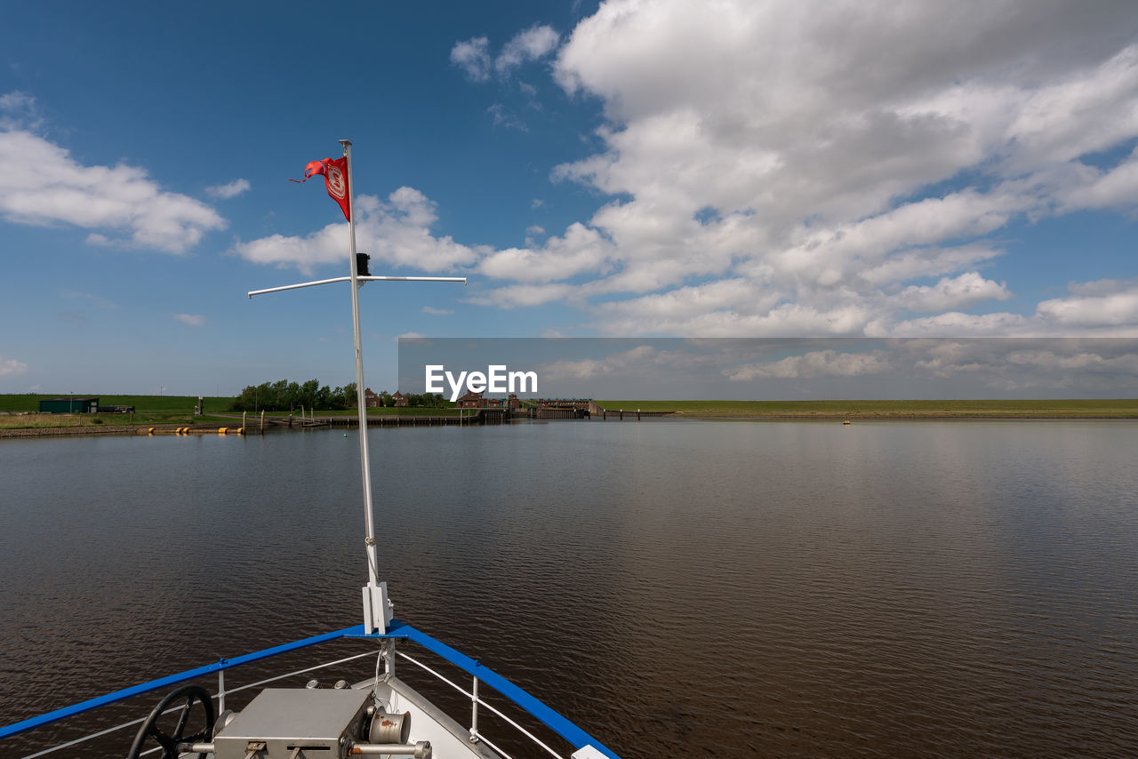 Cropped image of boat in sea against sky