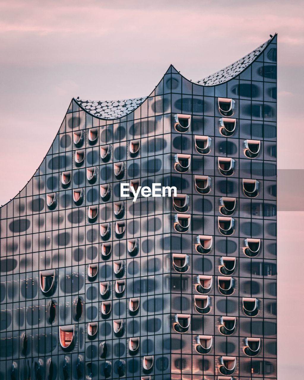 Low angle view of modern building against sky