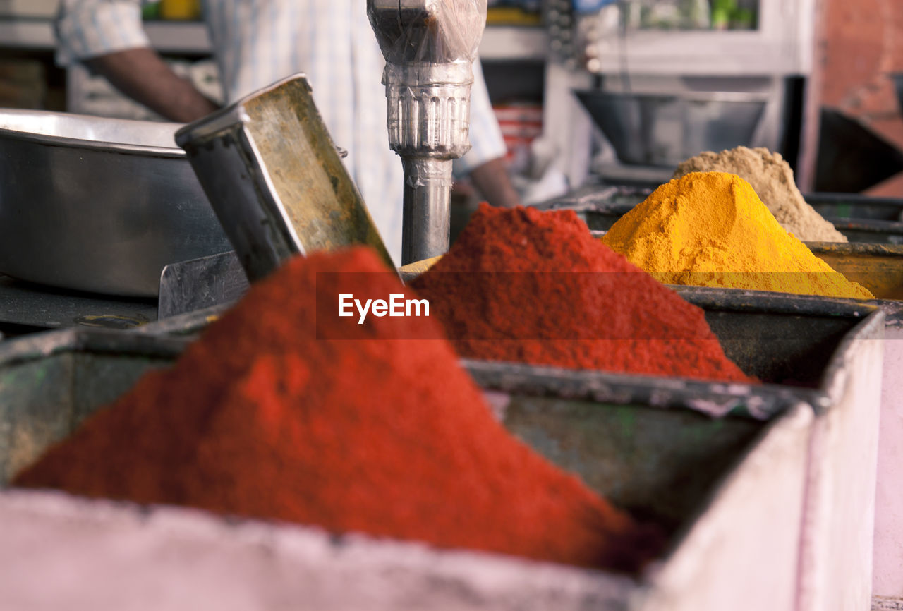 Close-up of spices in container at store