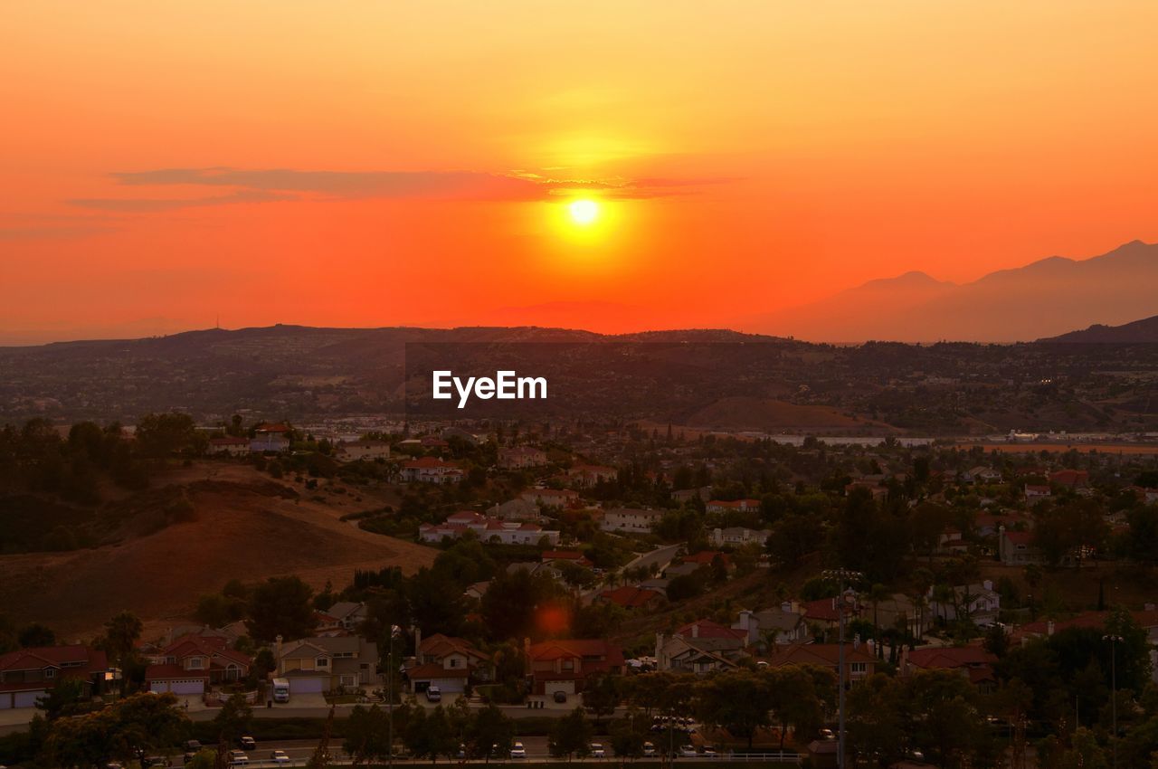 Scenic view of landscape against sky during sunset