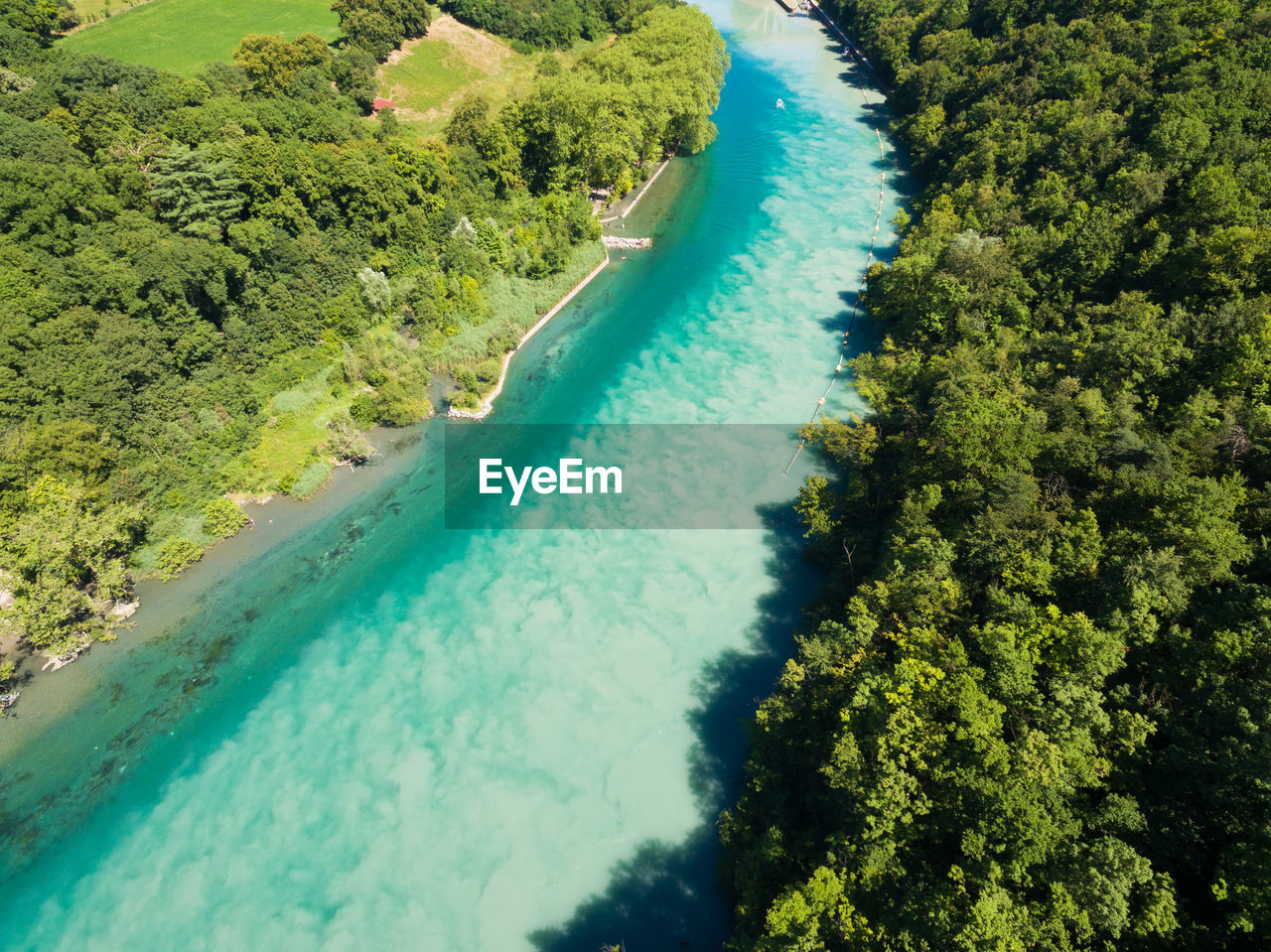 HIGH ANGLE VIEW OF SWIMMING POOL ON BEACH