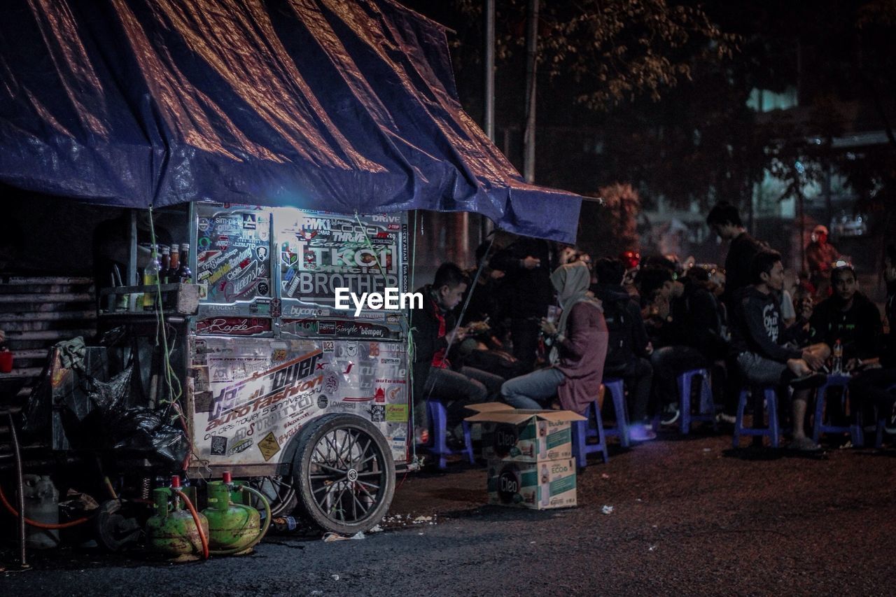 People eating at food stall