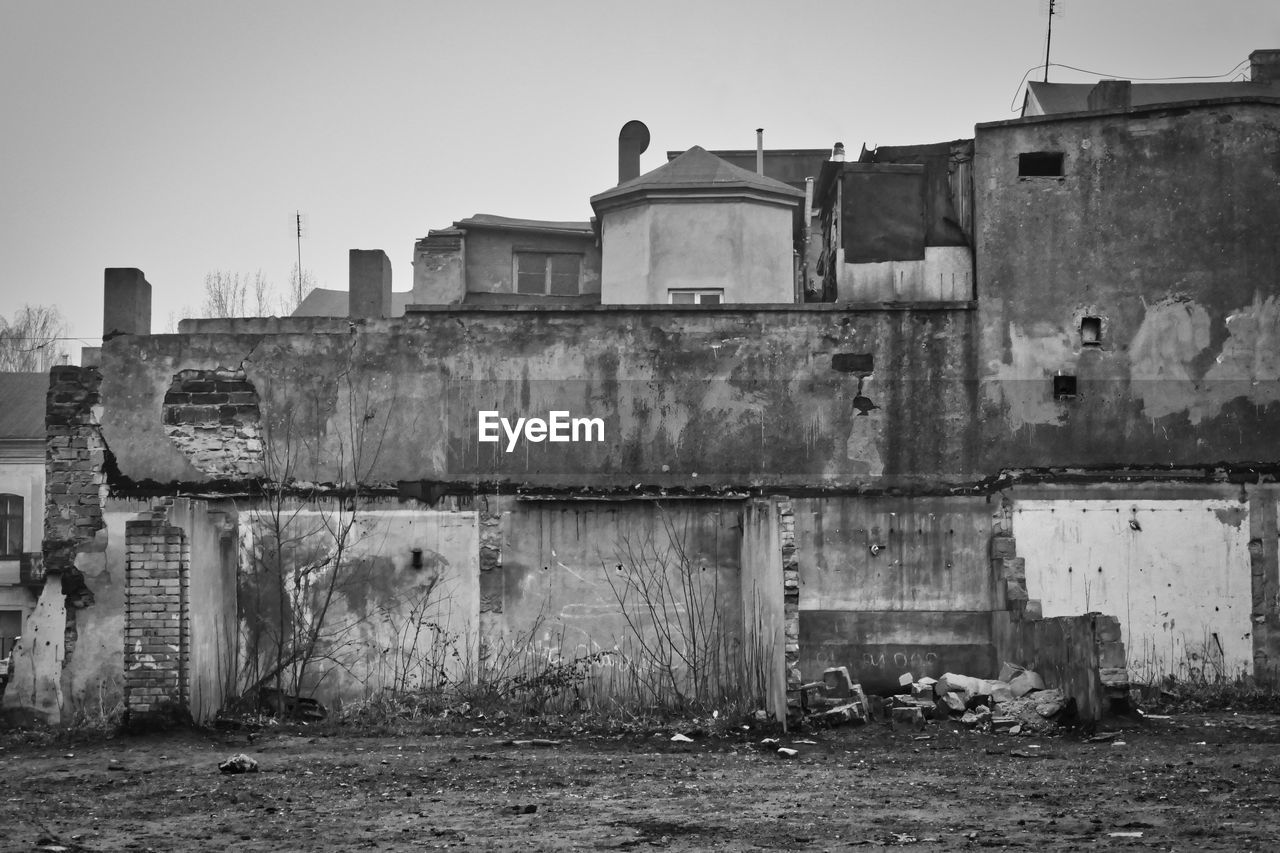 DAMAGED BUILDING AGAINST SKY