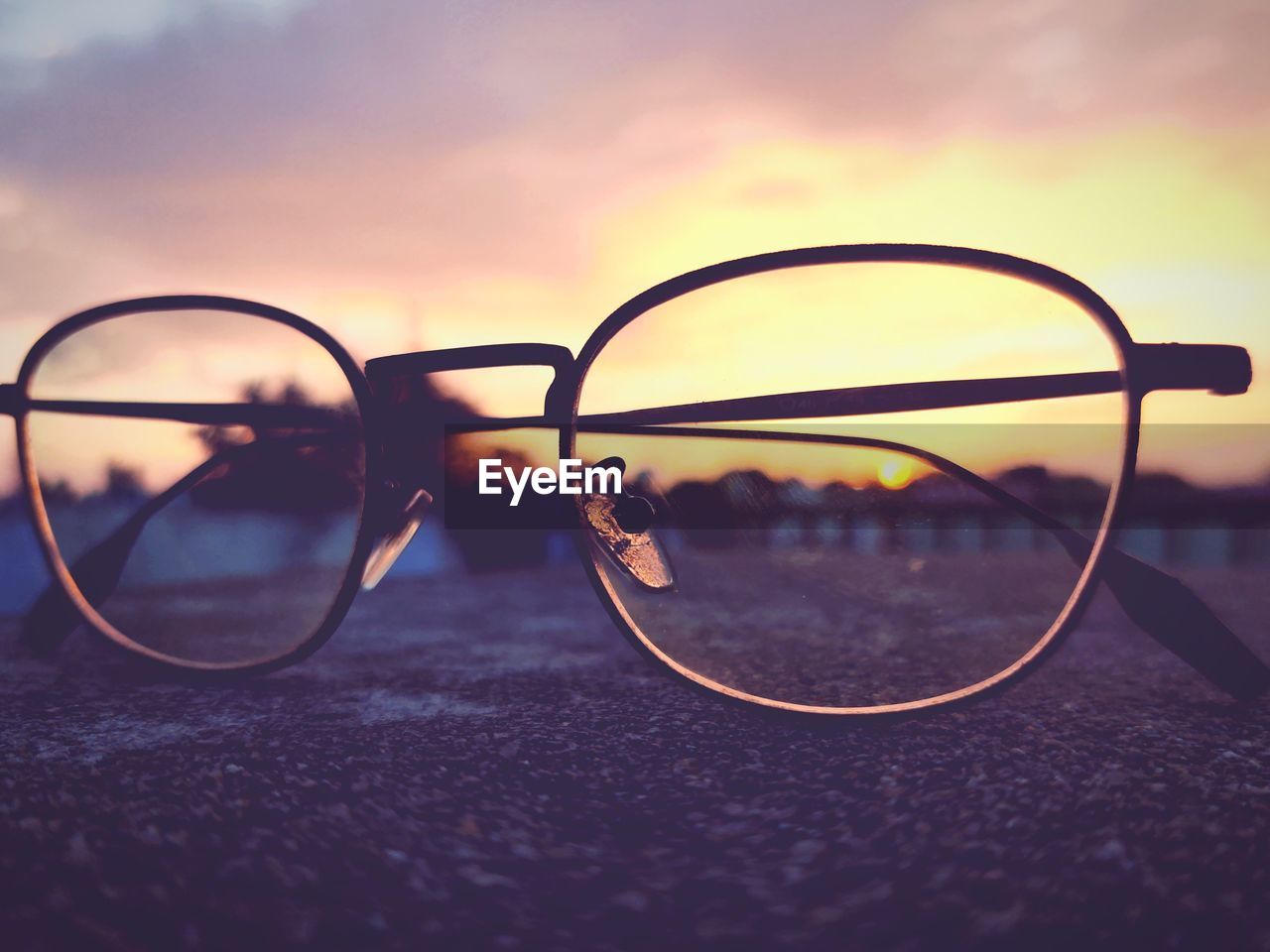 CLOSE-UP OF EYEGLASSES ON SUNGLASSES