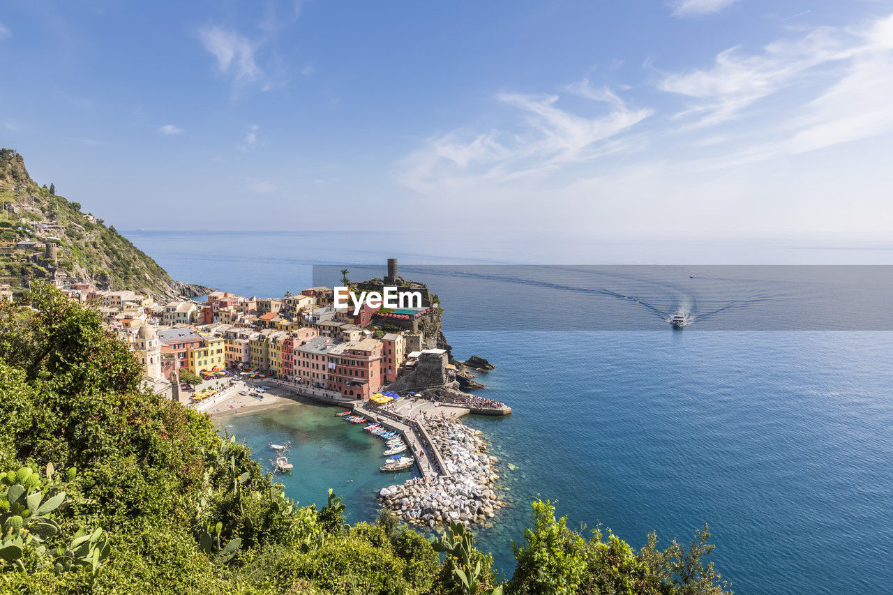 Italy, liguria, vernazza, view of coastal village along cinque terre in summer