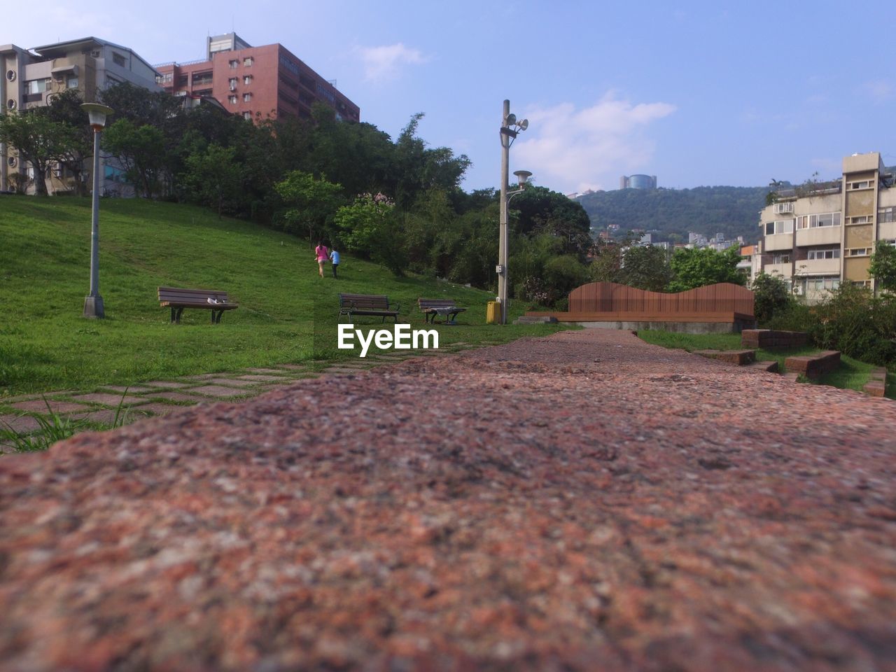 SURFACE LEVEL OF ROAD ALONG BUILDINGS