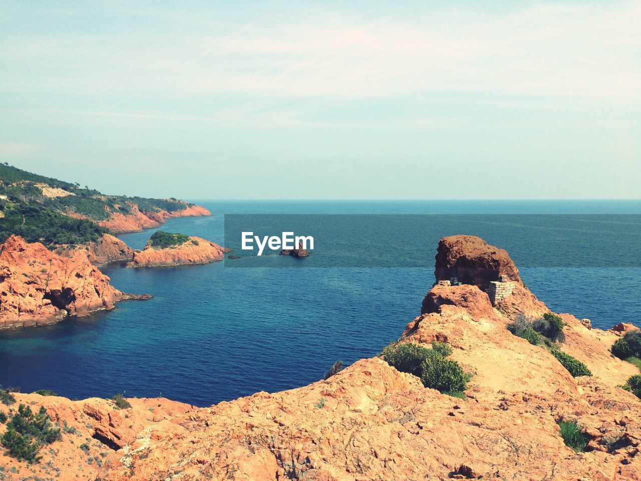 SCENIC VIEW OF SEA AND ROCKS