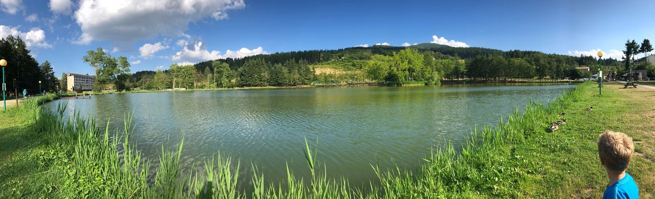 PANORAMIC SHOT OF LAKE AGAINST SKY