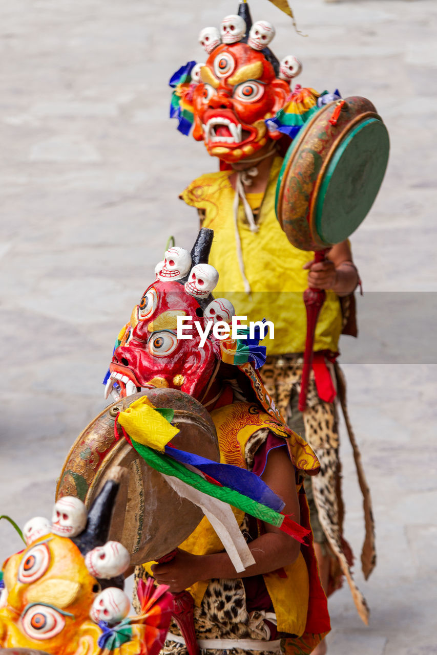 Close-up of person wearing costume outdoors