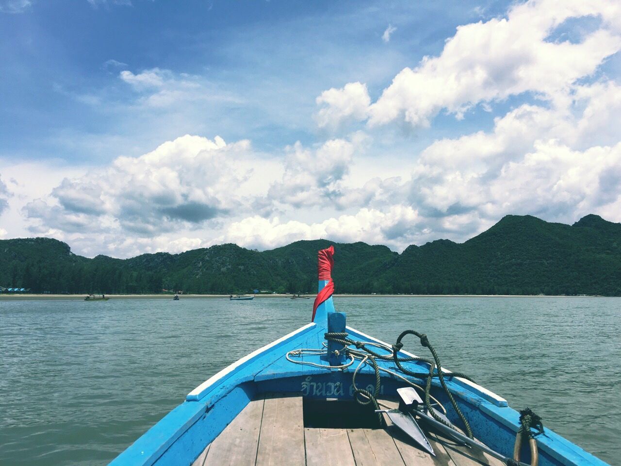 Wooden boat sailing on sea