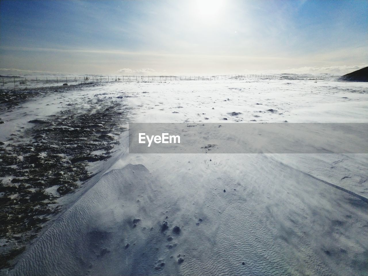 Scenic view of sea against sky during winter