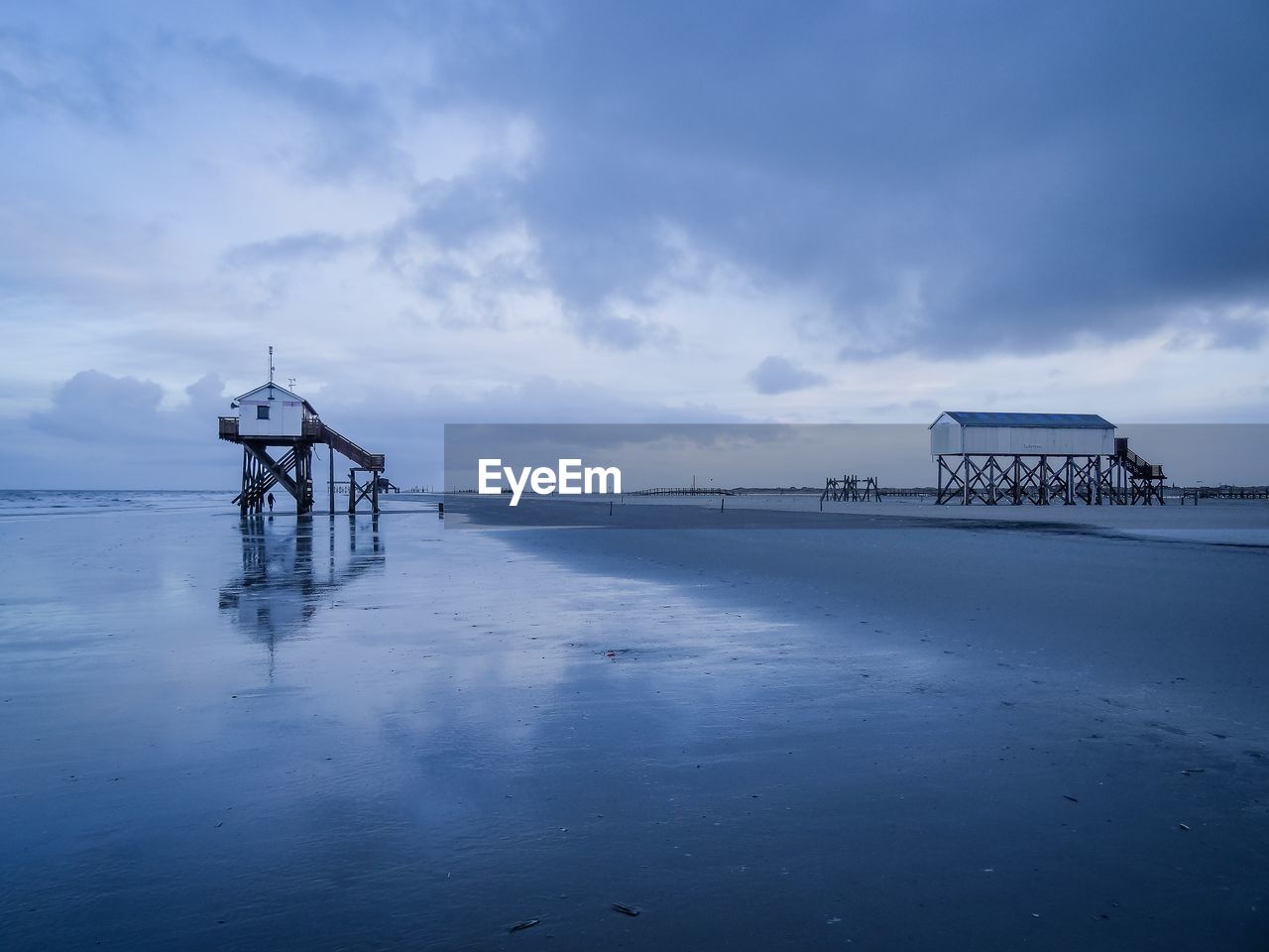Scenic view of sea against sky during winter