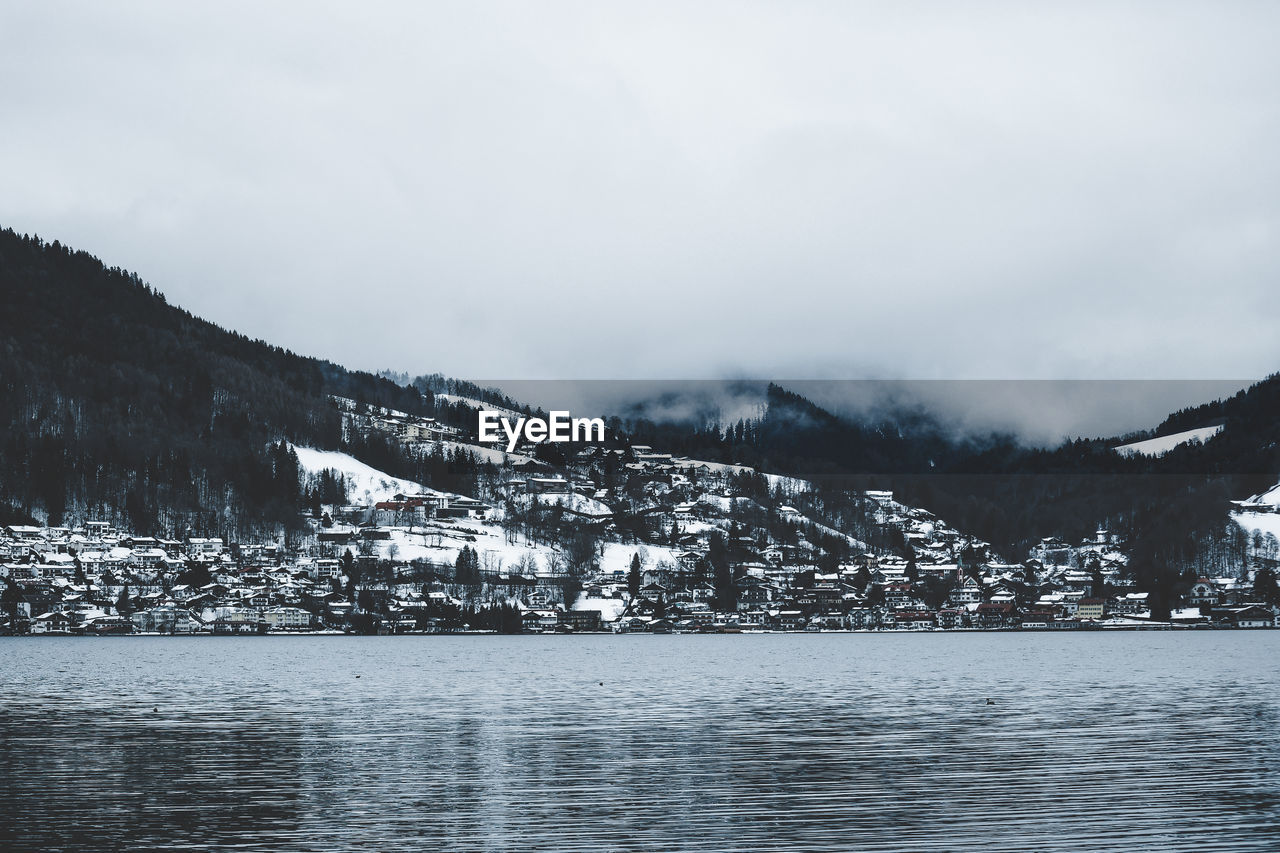 Scenic view of snowcapped mountains against sky during winter