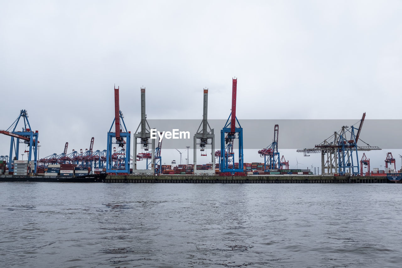 VIEW OF CRANES AT COMMERCIAL DOCK