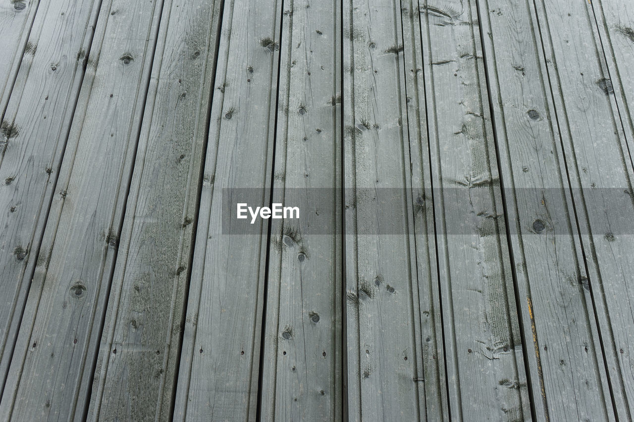 Sun-bleached planks of the roofs in the village