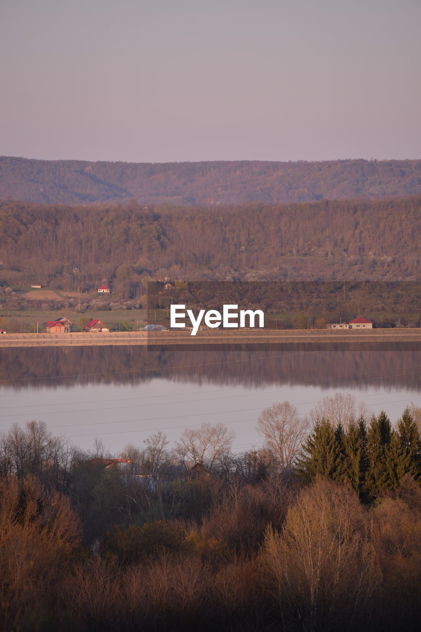 SCENIC VIEW OF LAKE AGAINST CLEAR SKY