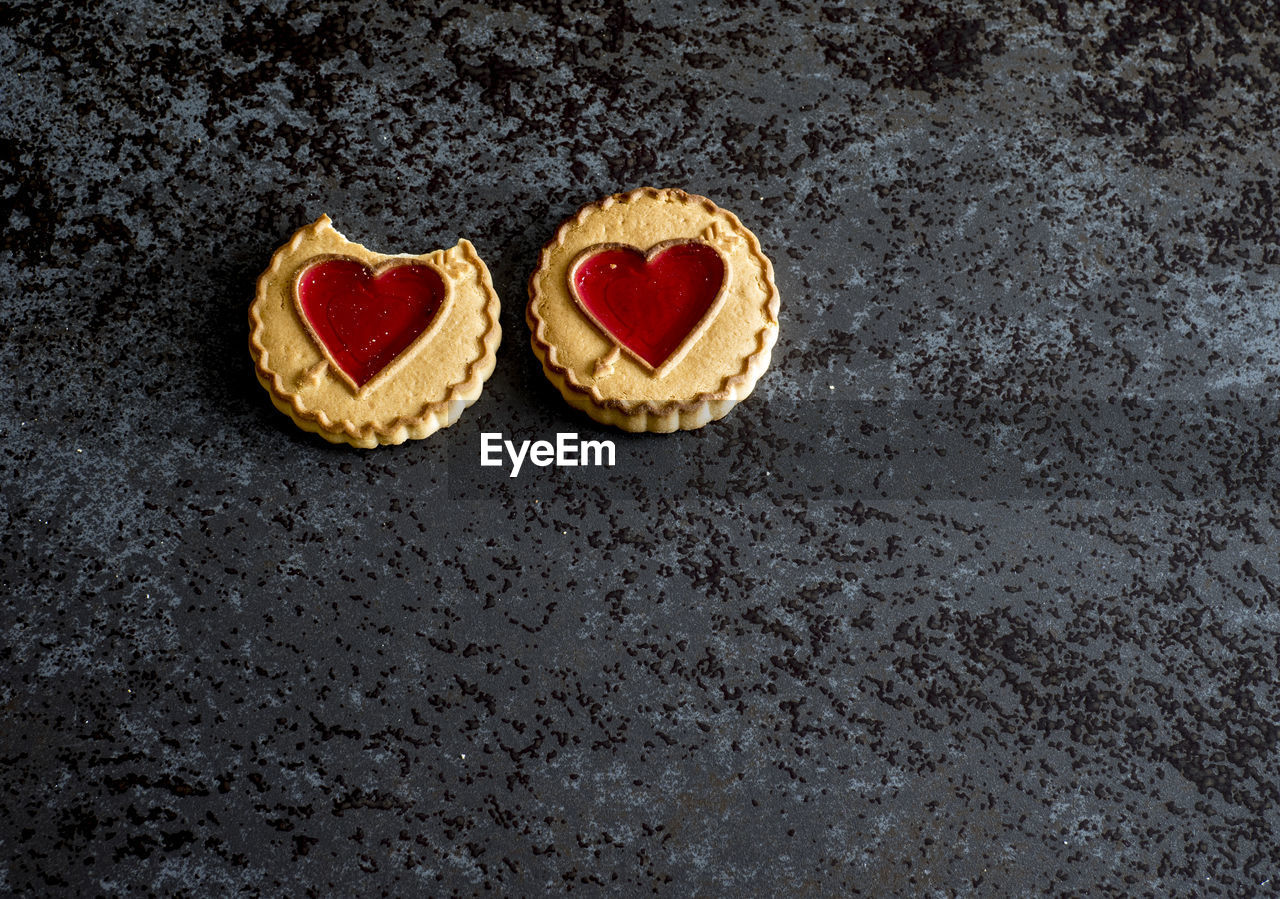 High angle view of cookies with heart shape on table