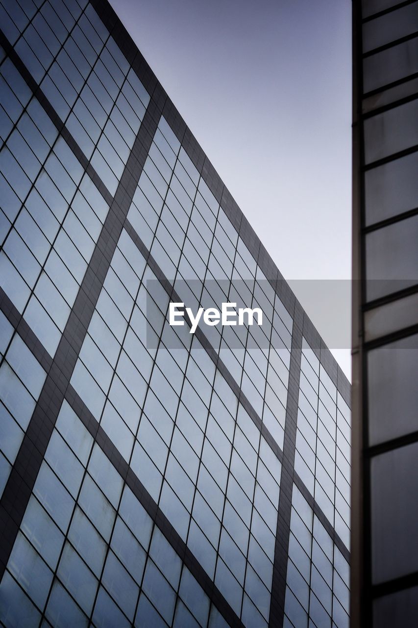 Low angle view of modern building against clear sky