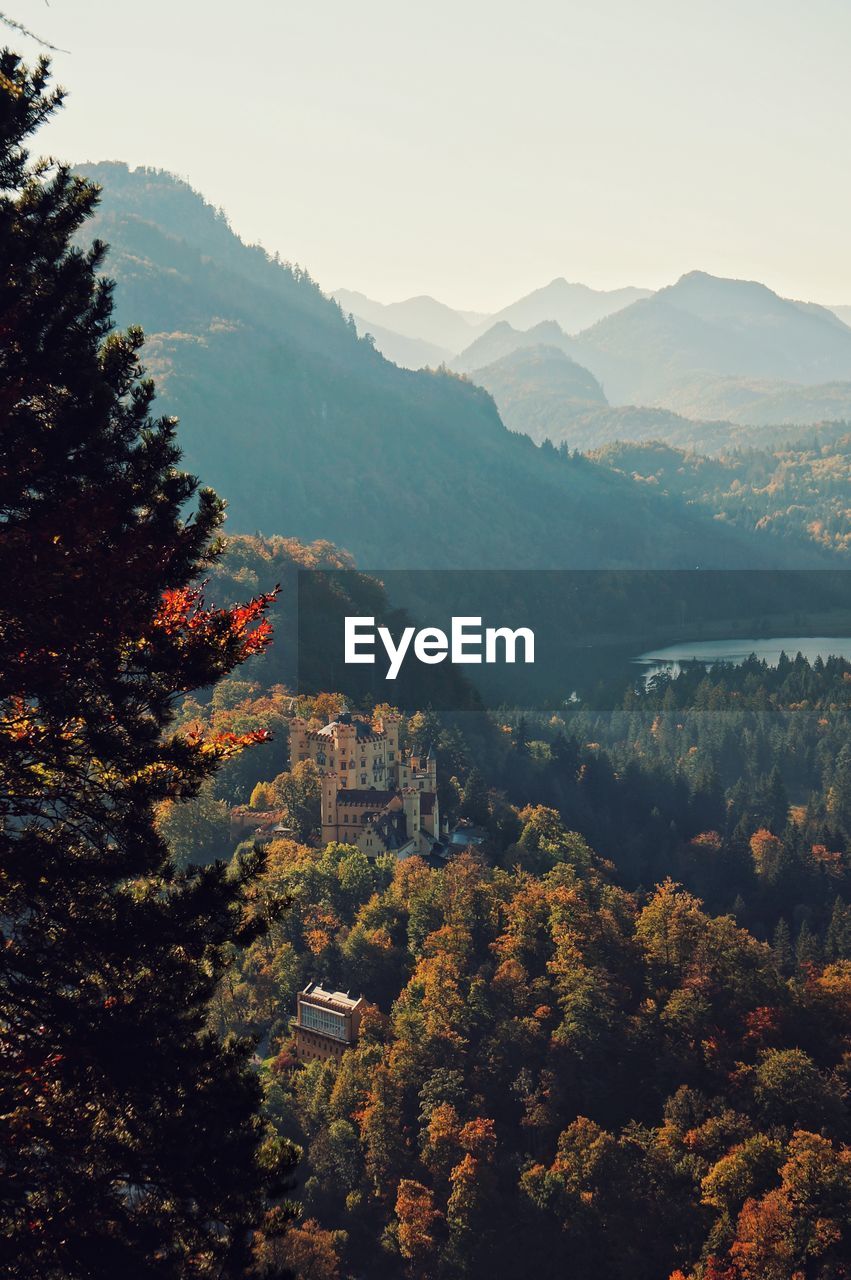 High angle view of trees and mountains against sky
