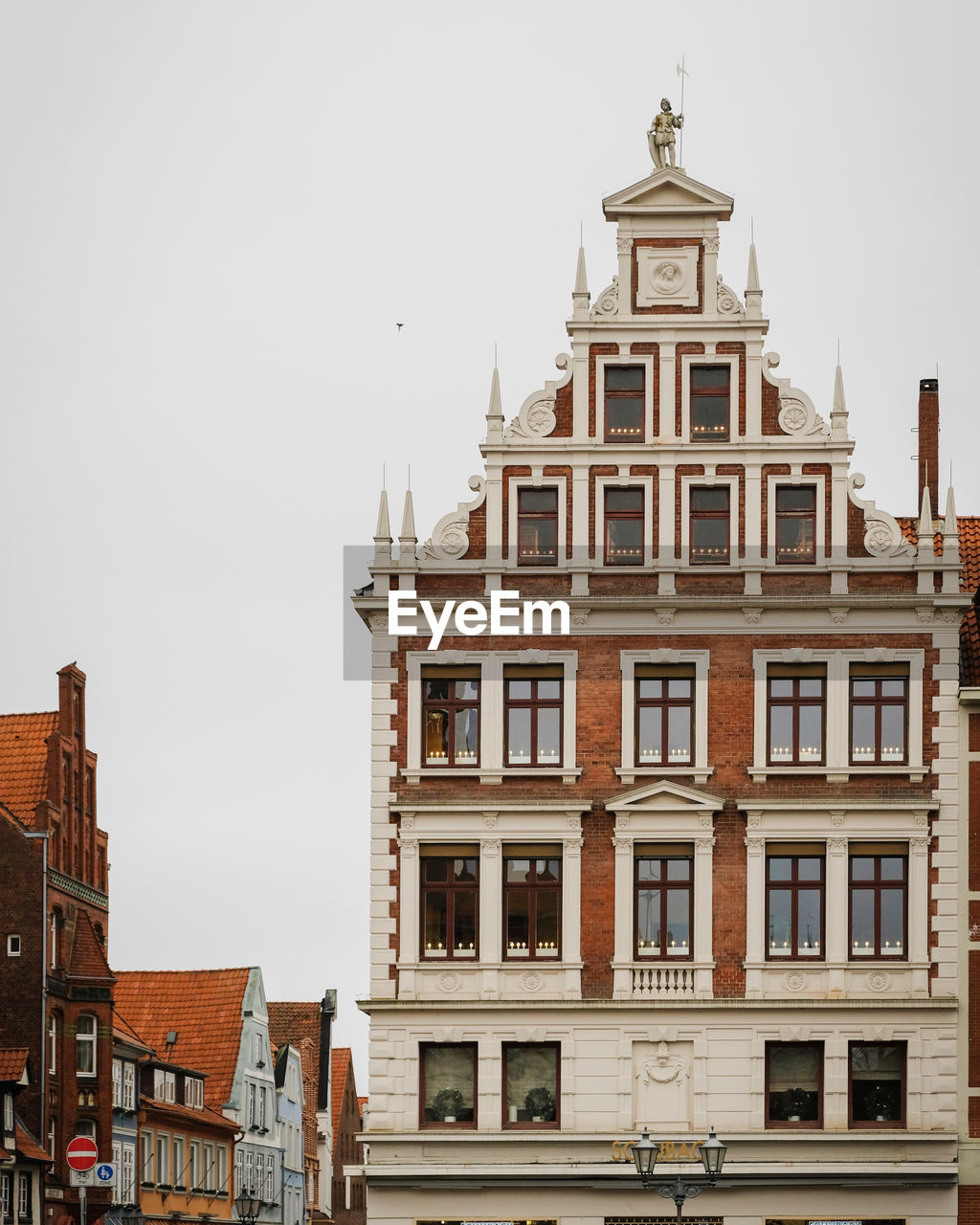 Low angle view of old buildings with beautiful architecture against sky