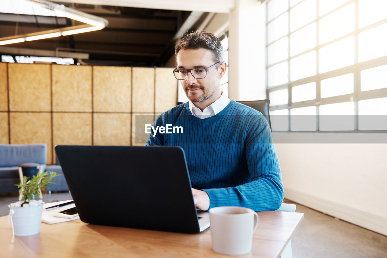 Man working on table