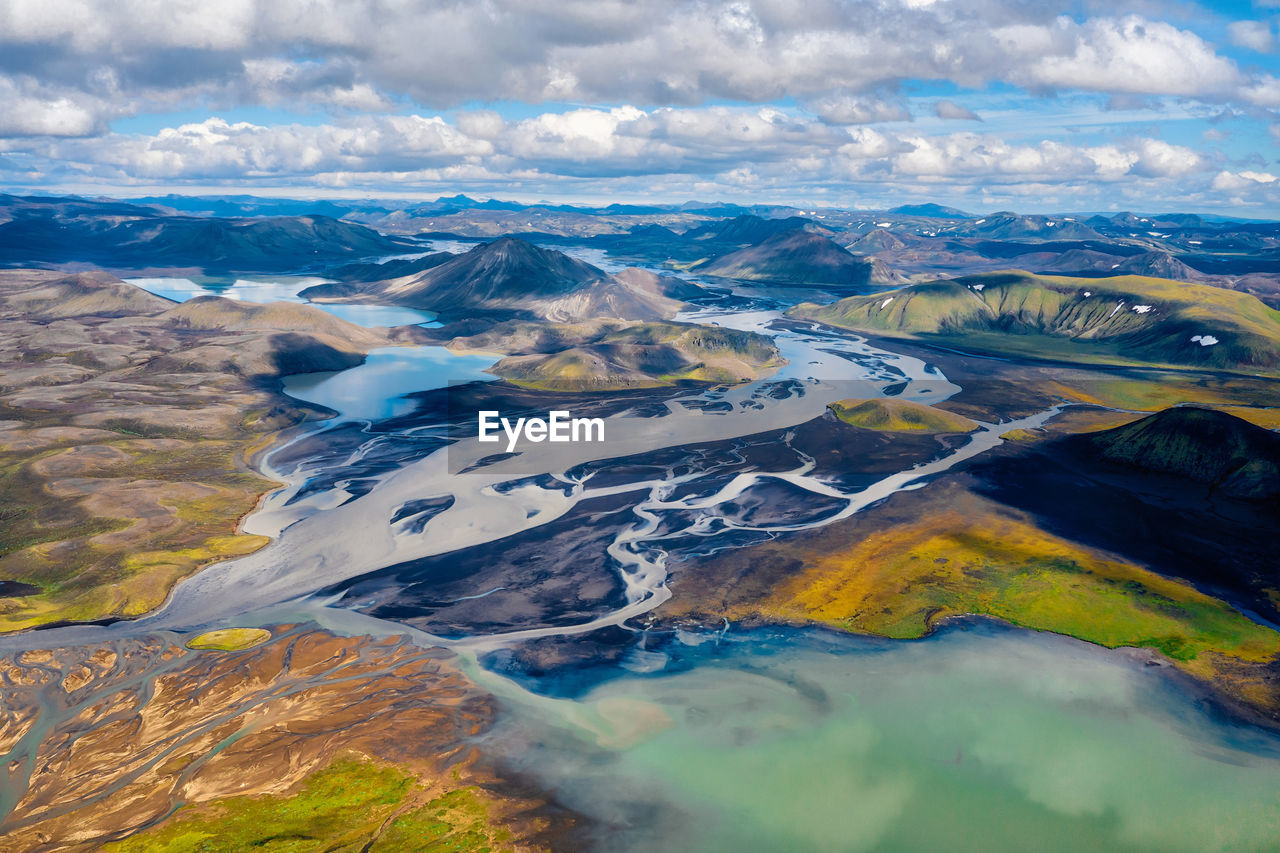 Aerial view of landscape and mountains against sky