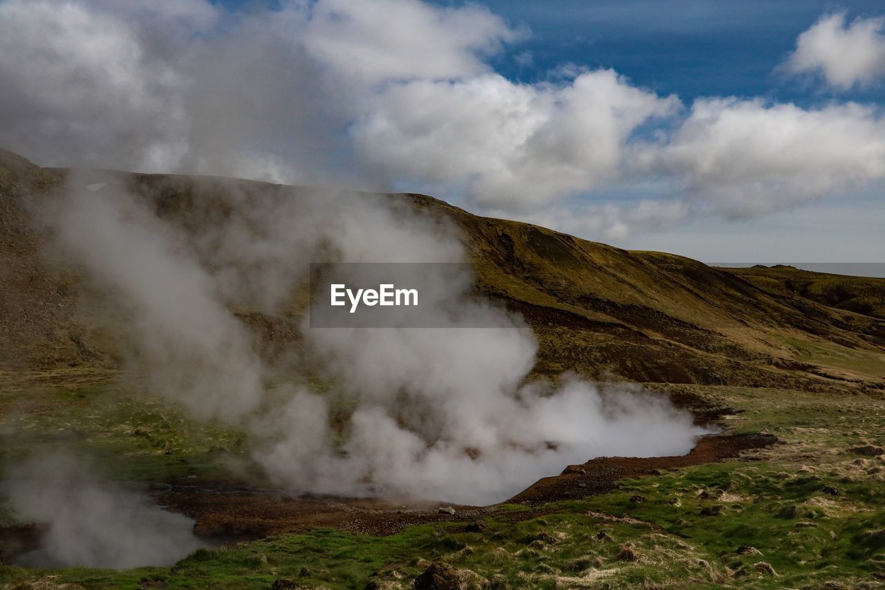 SMOKE EMITTING FROM VOLCANIC LANDSCAPE