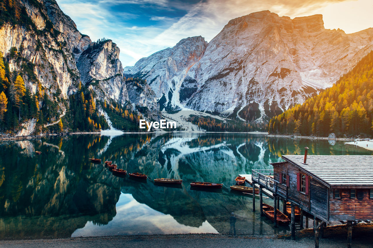 SCENIC VIEW OF SNOWCAPPED MOUNTAINS AND LAKE