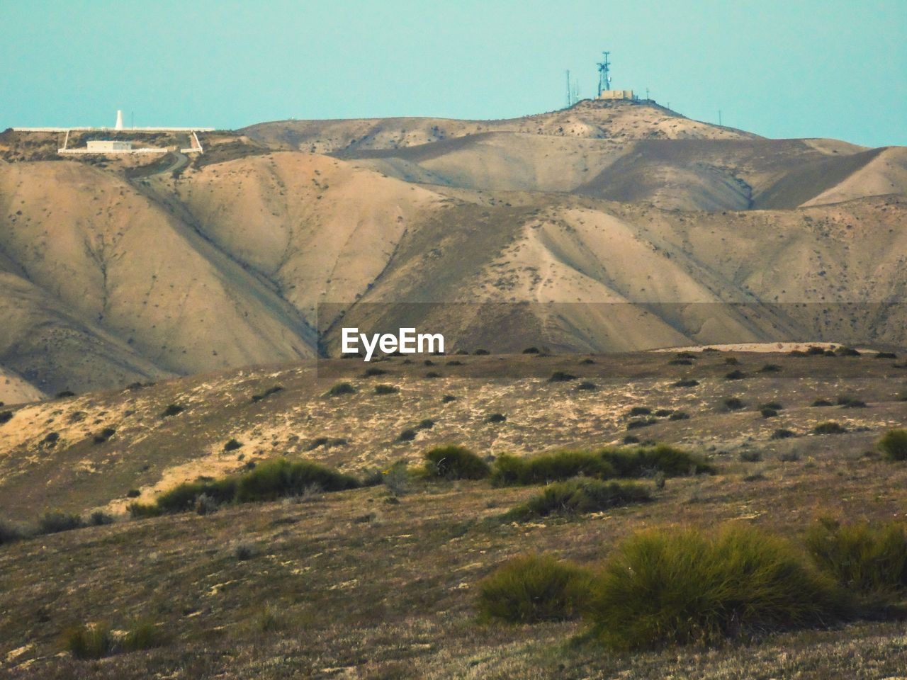 Landscape against mountain range