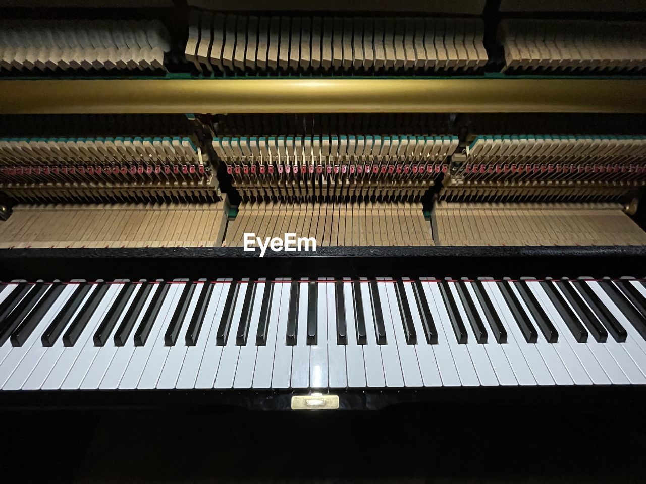 piano, electronic device, music, keyboard, musical instrument, musical equipment, piano key, arts culture and entertainment, computer component, string instrument, indoors, no people, musical keyboard, electronic instrument, electric piano, keyboard instrument, celesta, digital piano, grand piano, spinet, close-up