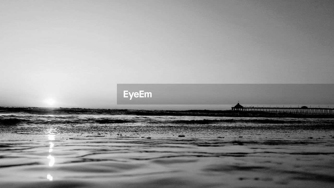 VIEW OF SEA AGAINST CLEAR SKY