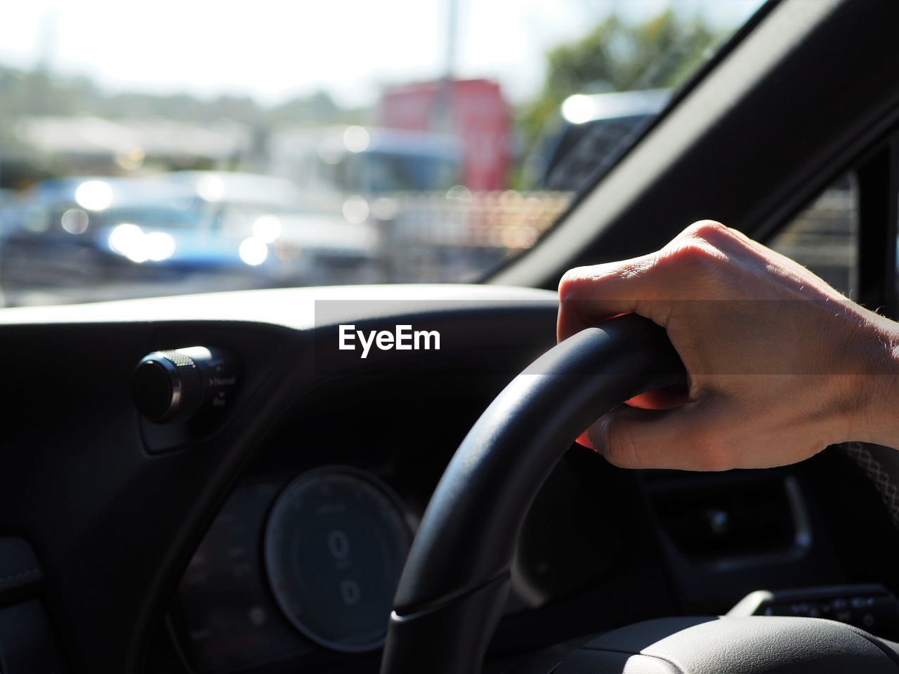 CLOSE-UP OF HAND WITH CAR