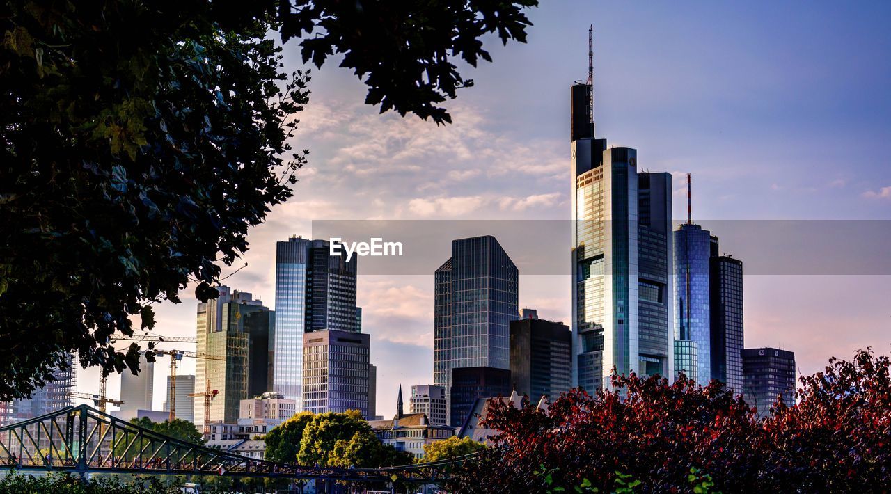 Low angle view of buildings against sky during sunset