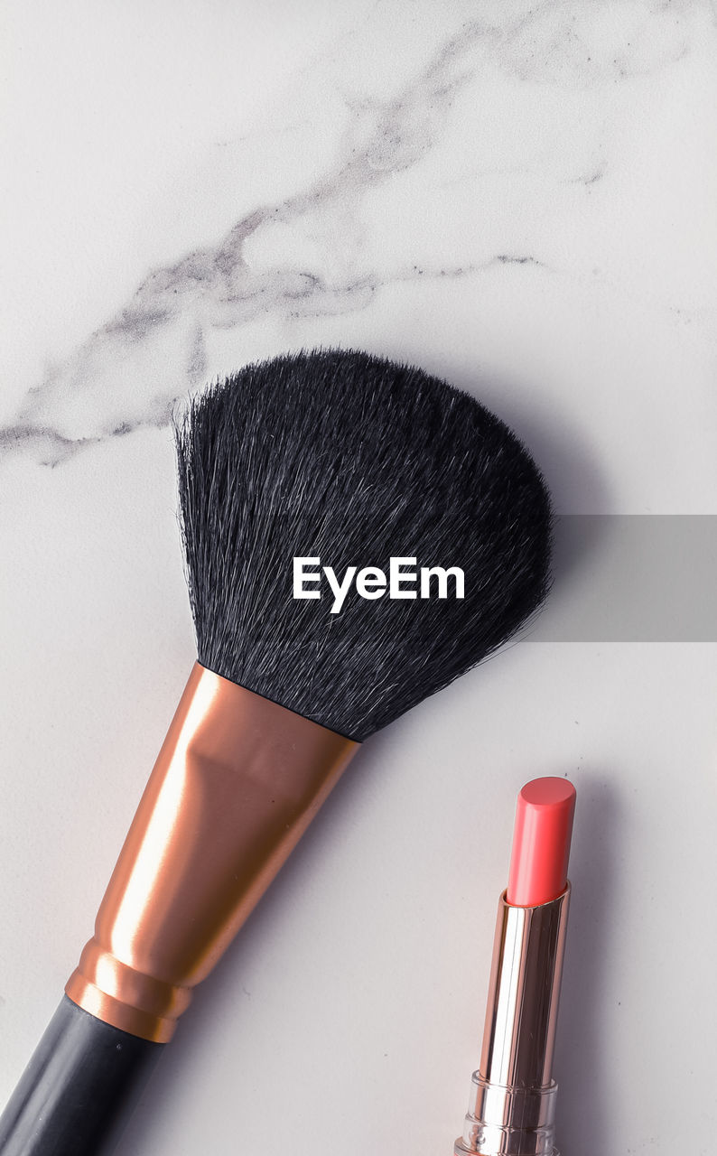 high angle view of make-up brushes on table