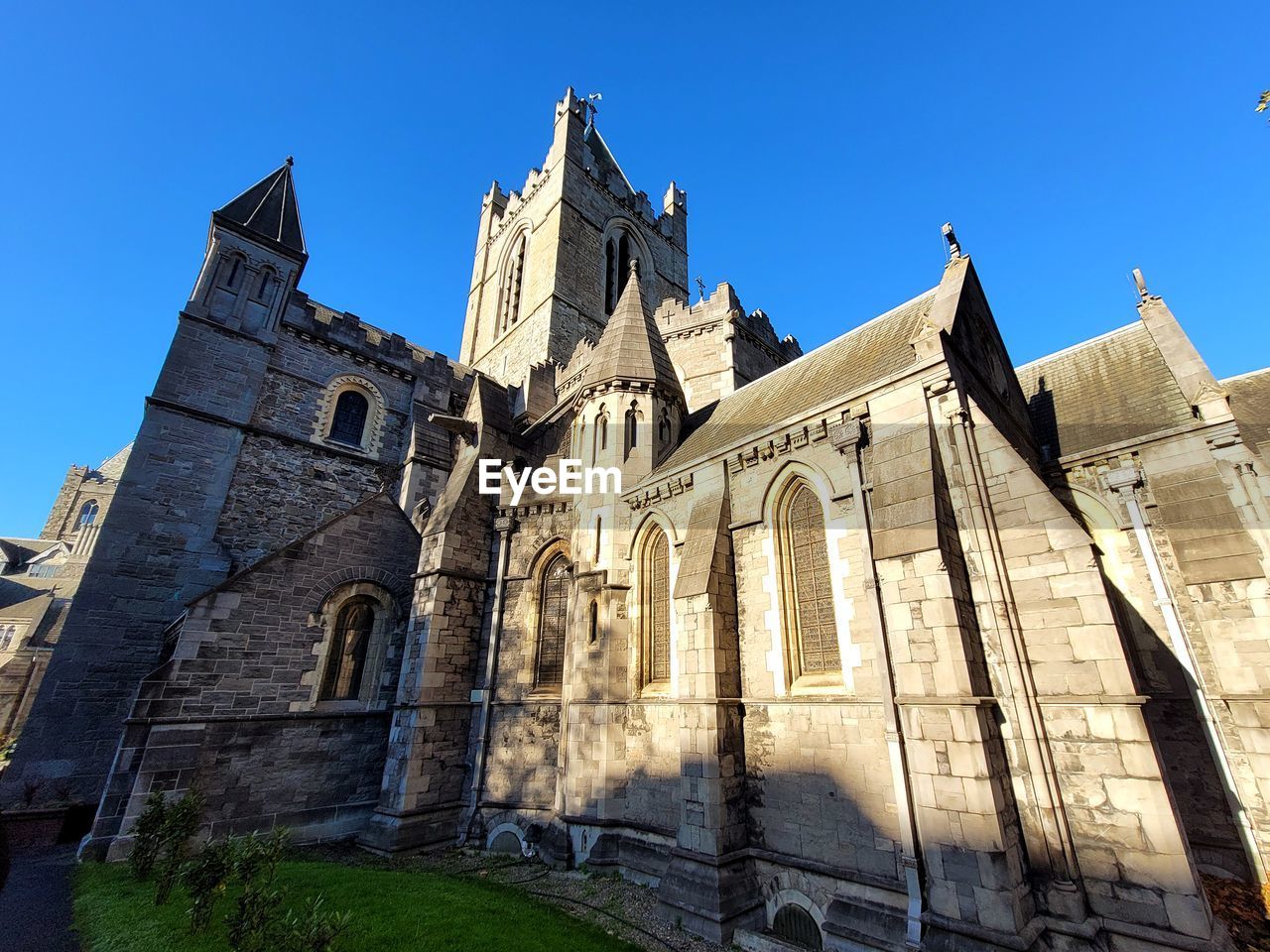 Low angle view of historic building against sky - christ church cathedral dublin