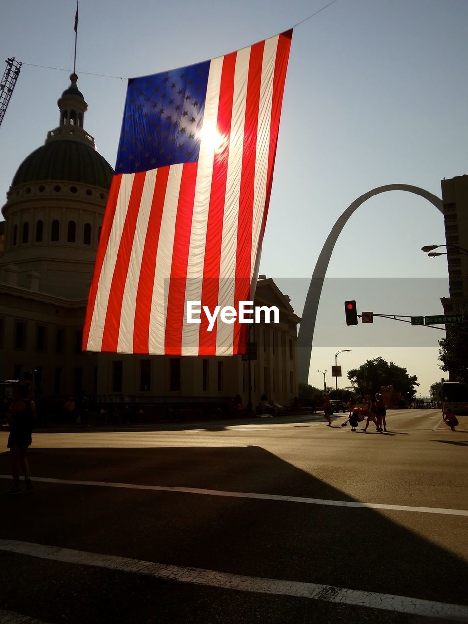 American flag and gateway arch