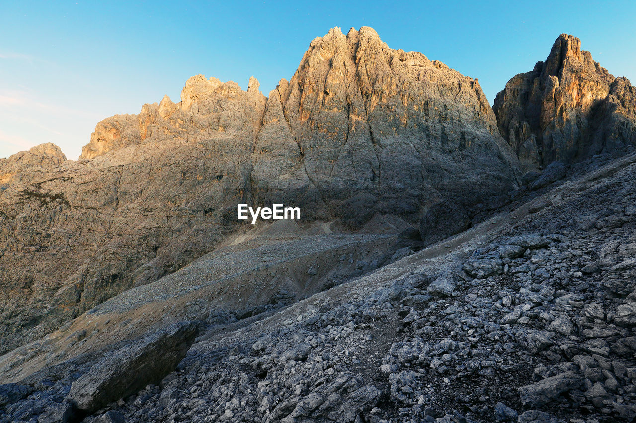 Scenic view of rocky mountains against sky