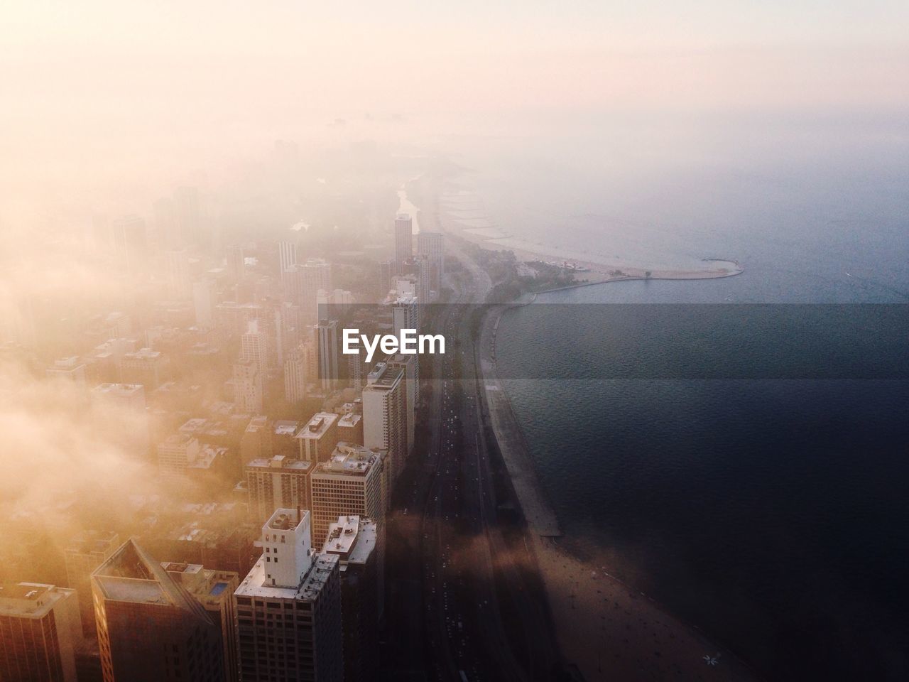 Aerial view of city at sunset