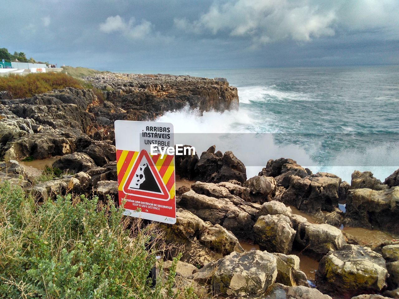 Waves crash near unstable cliffs