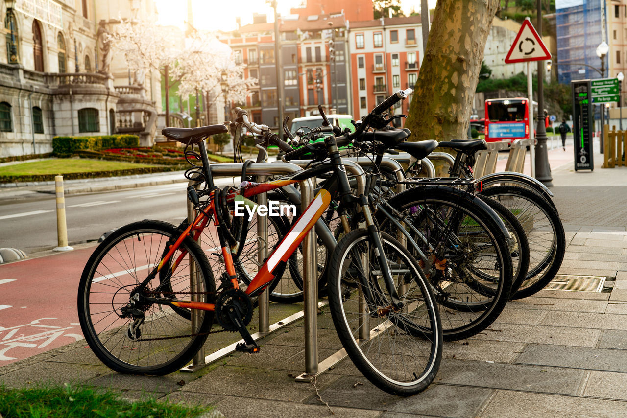 Bicycle at bike station for rent to travel or transport in the city. sustainable travel. 