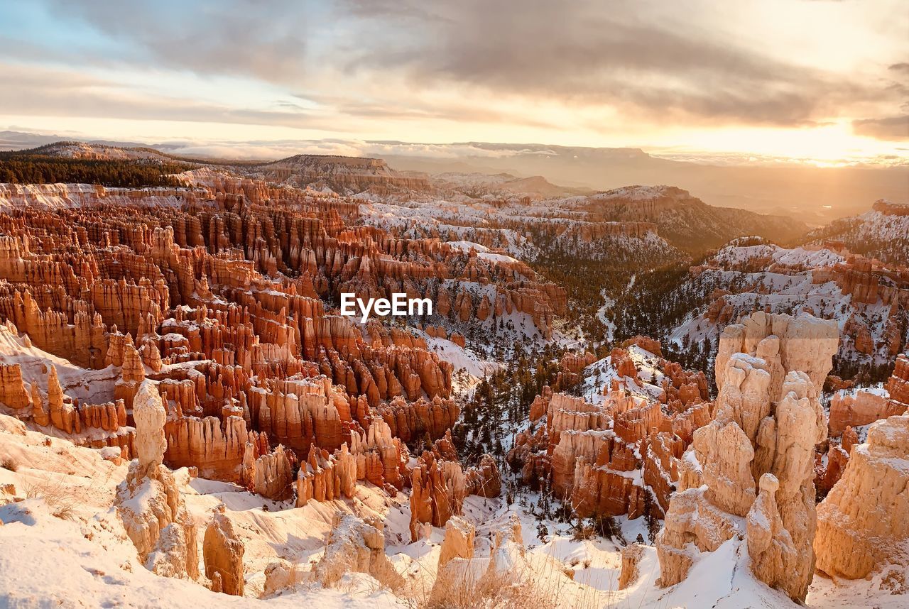 Snow covered bryce canyon at sunrise